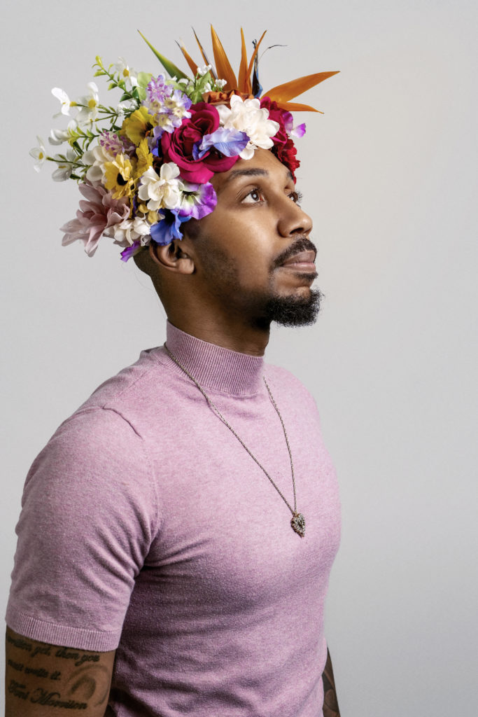 george m johnson adorned with flowers